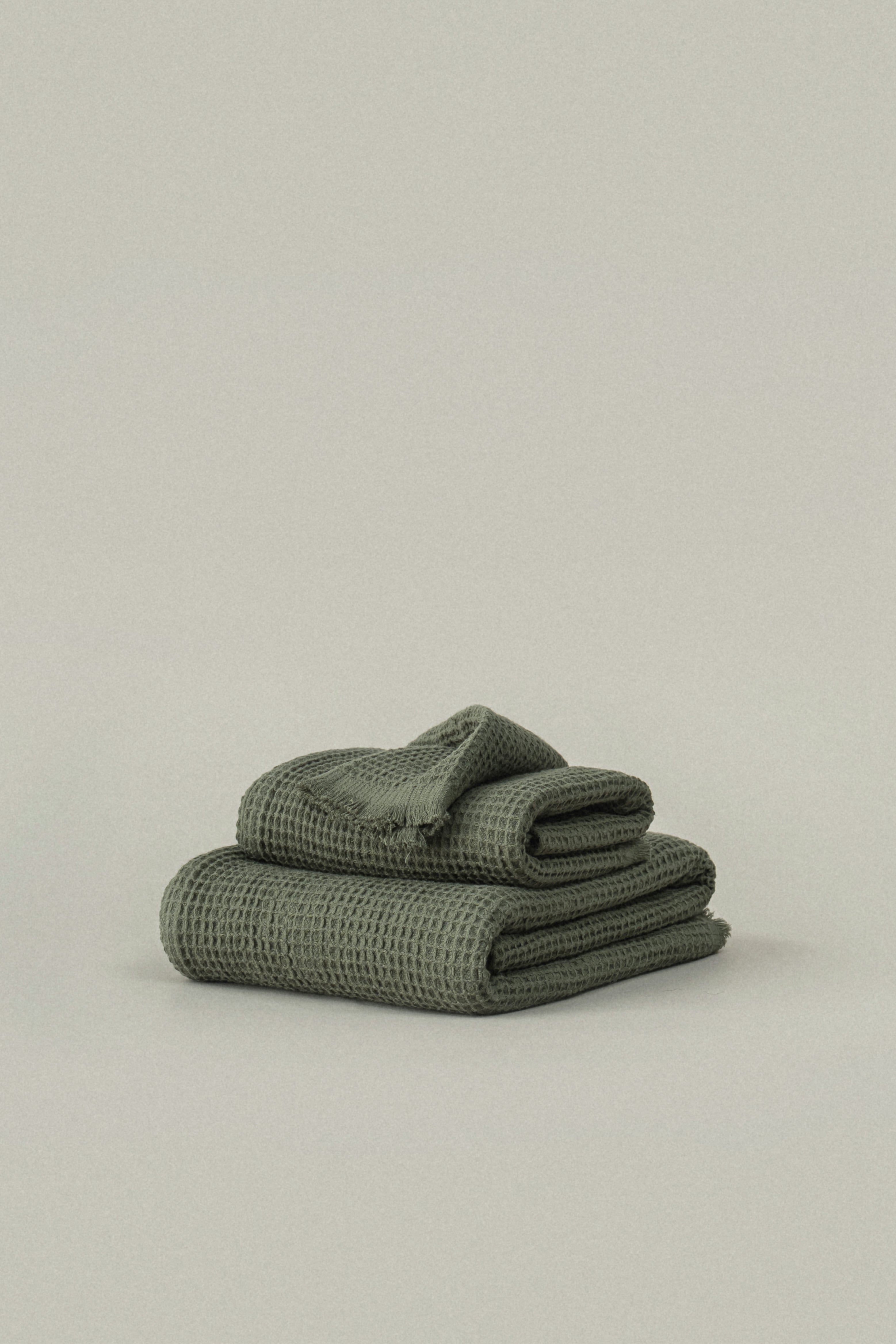 Old green waffle hand towel – Natural Cuddles